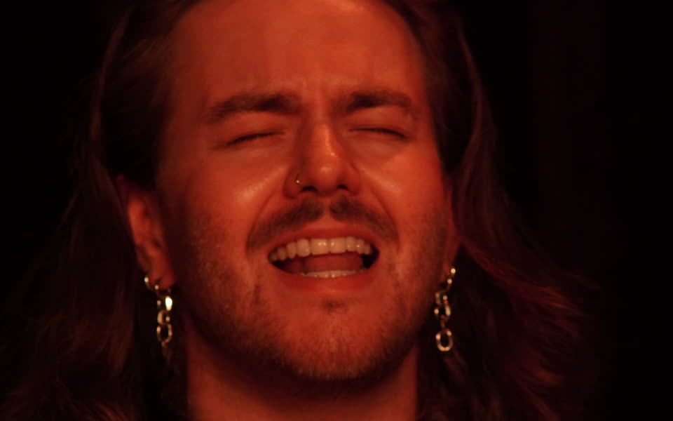 Kevin playing drums at Cameron House